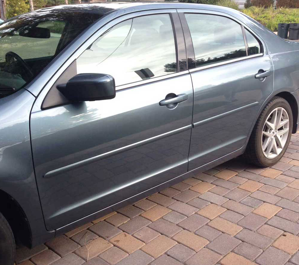 Nissan Factory Style Body Side Molding w/ Pointed Ends in Colors.