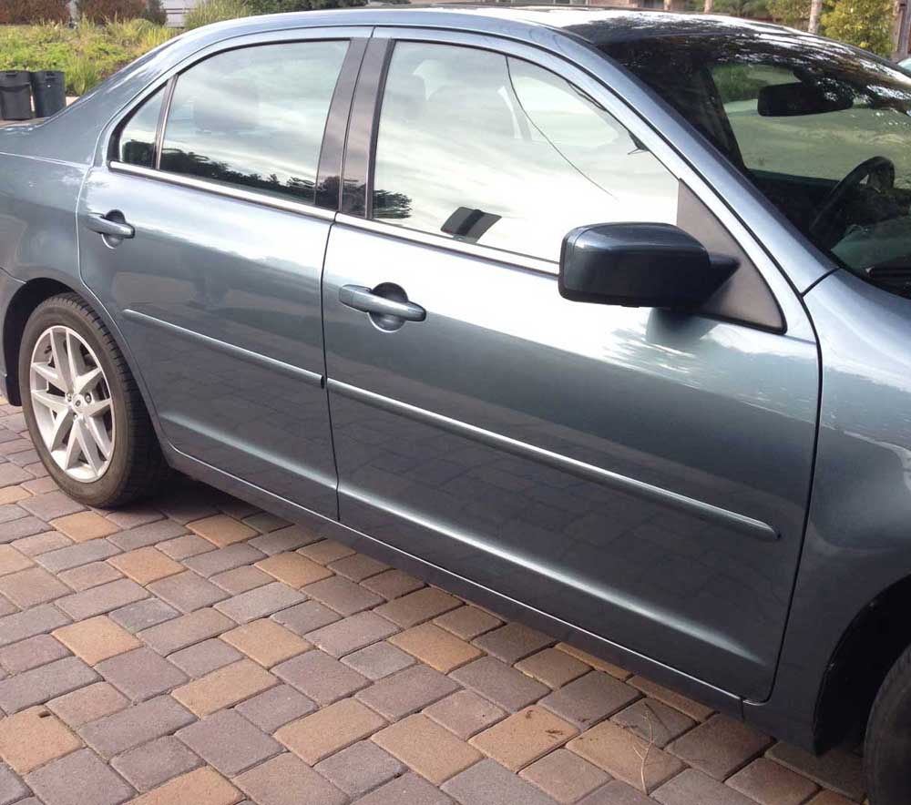 Nissan Factory Style Body Side Molding w/ Pointed Ends in Colors.